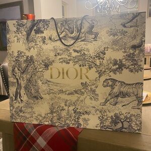 Authentic X- Large Dior paper bag.
25H x 20L x 8W